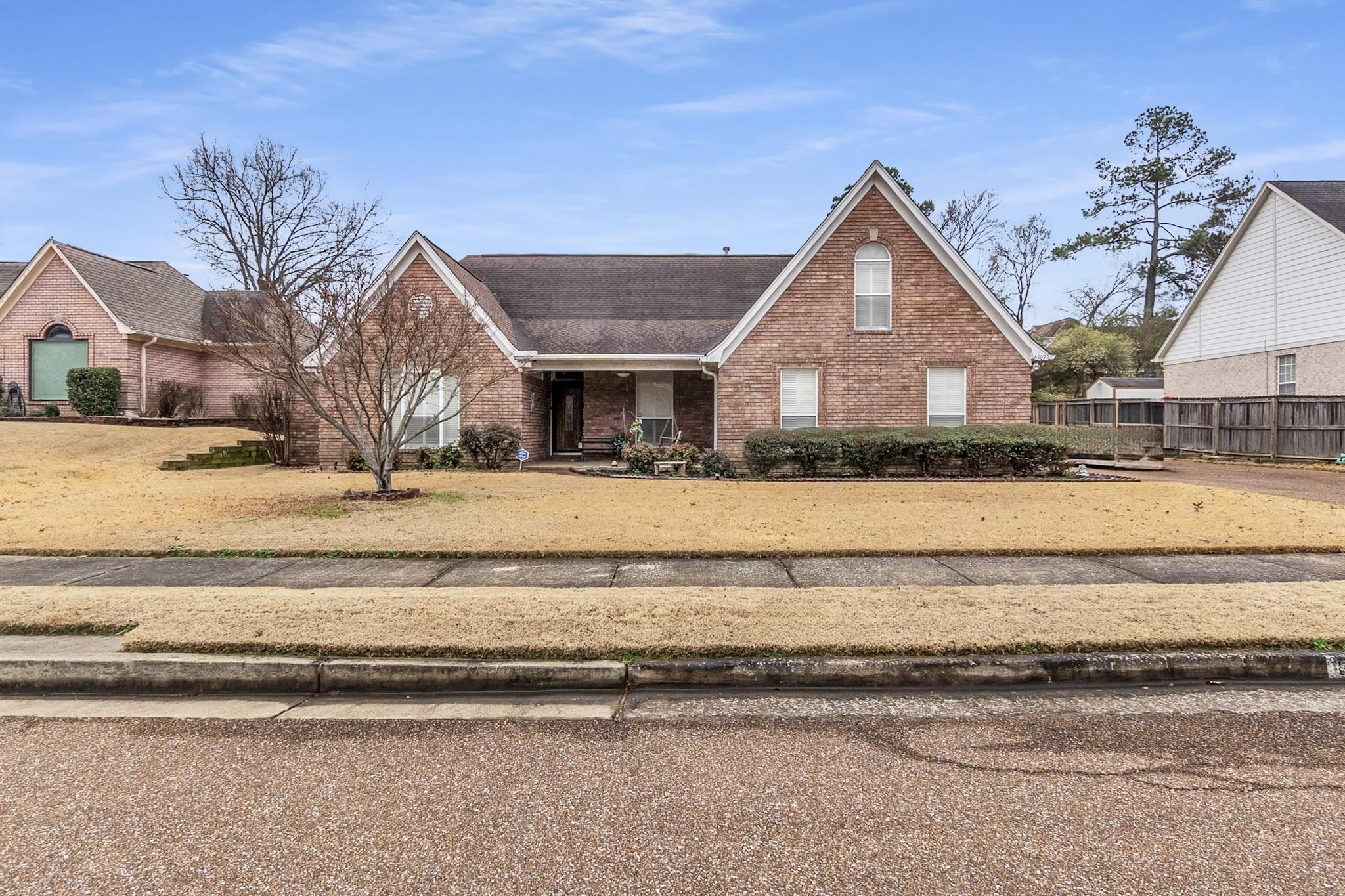 6307 Thistle Point Bartlett, TN 38135 - Photo 28 of 31 a view of a house with a yard next to a road