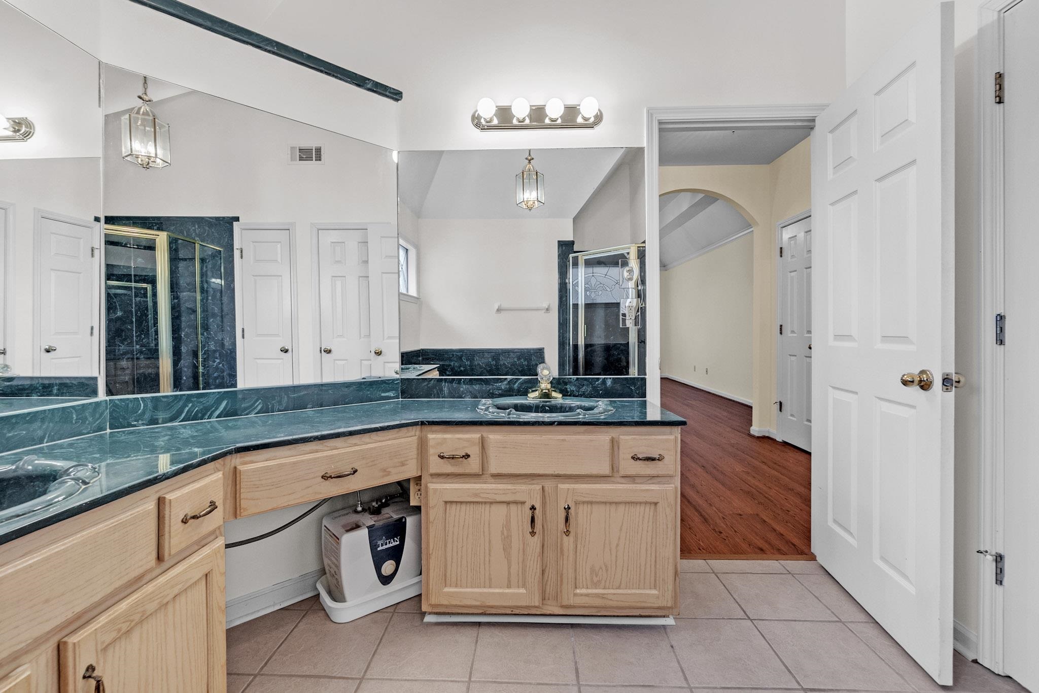 6307 Thistle Point Bartlett, TN 38135 - Photo 29 of 31 a bathroom with a sink and a mirror