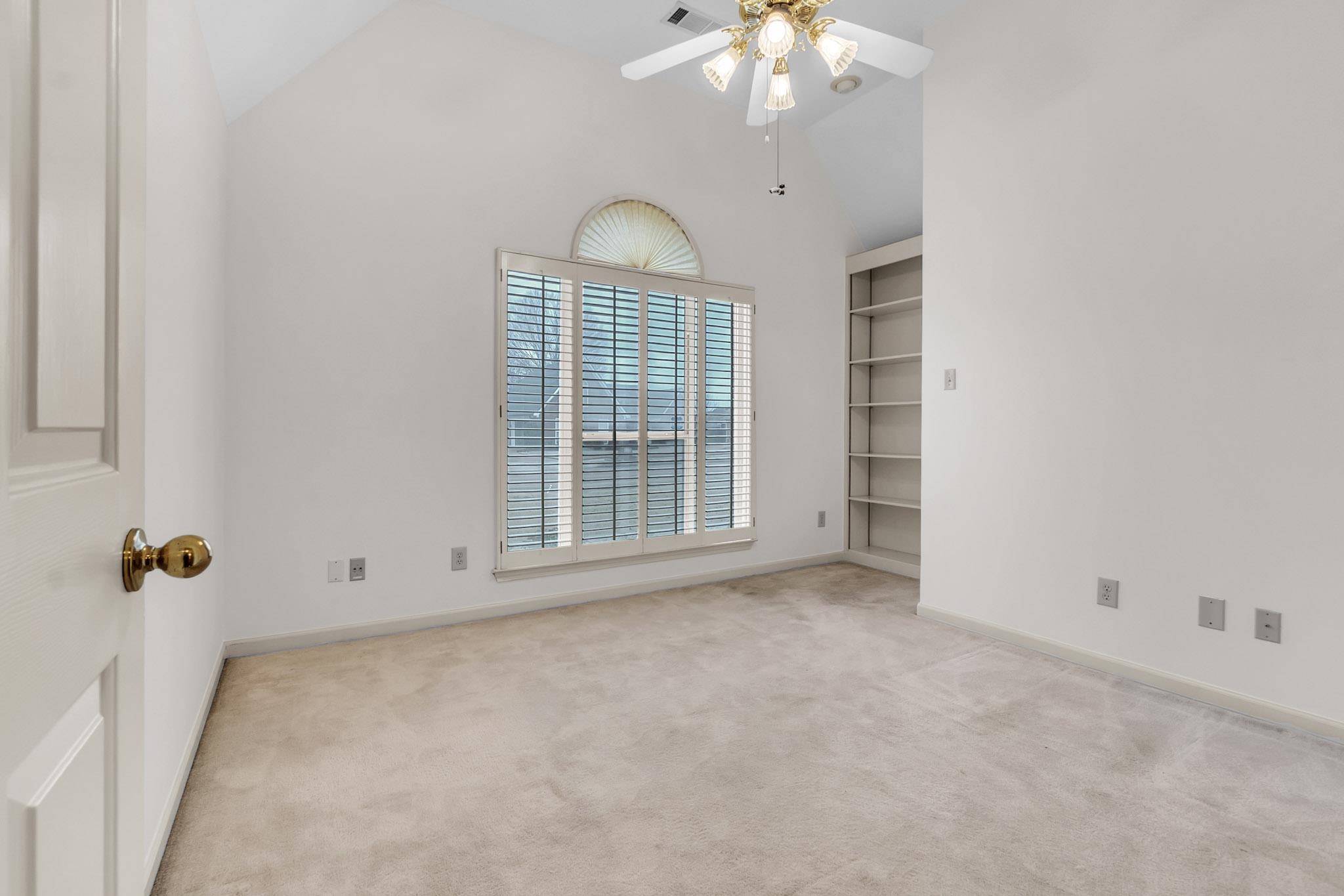 6307 Thistle Point Bartlett, TN 38135 - Photo 8 of 31 an empty room with chandelier fan