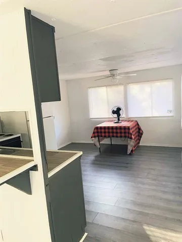 a room with a bed and a window