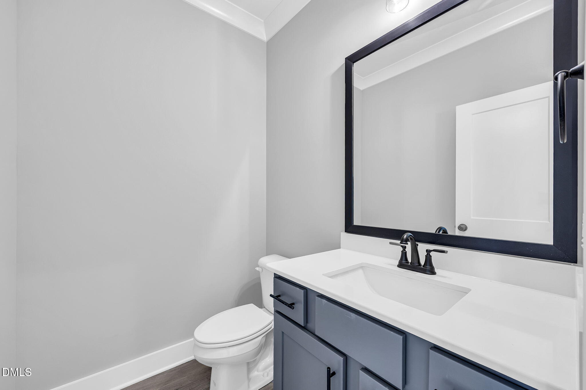 250 Freedom Ridge Drive Smithfield, NC 27577 - Photo 14 of 32 a bathroom with a sink and a toilet