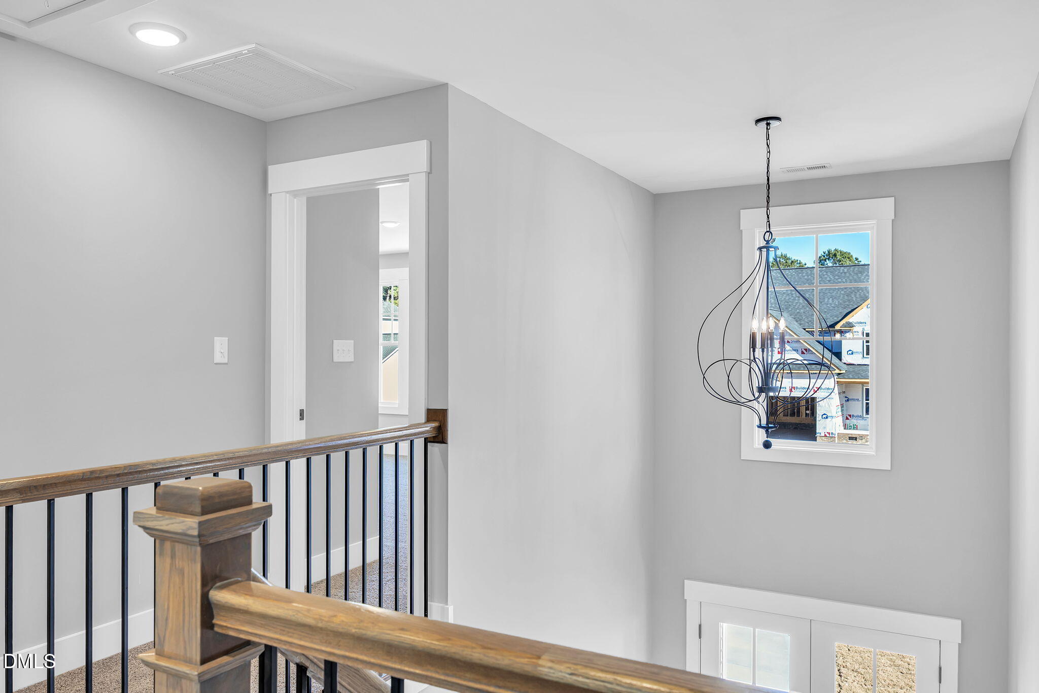 250 Freedom Ridge Drive Smithfield, NC 27577 - Photo 20 of 32 a view of a hallway with windows