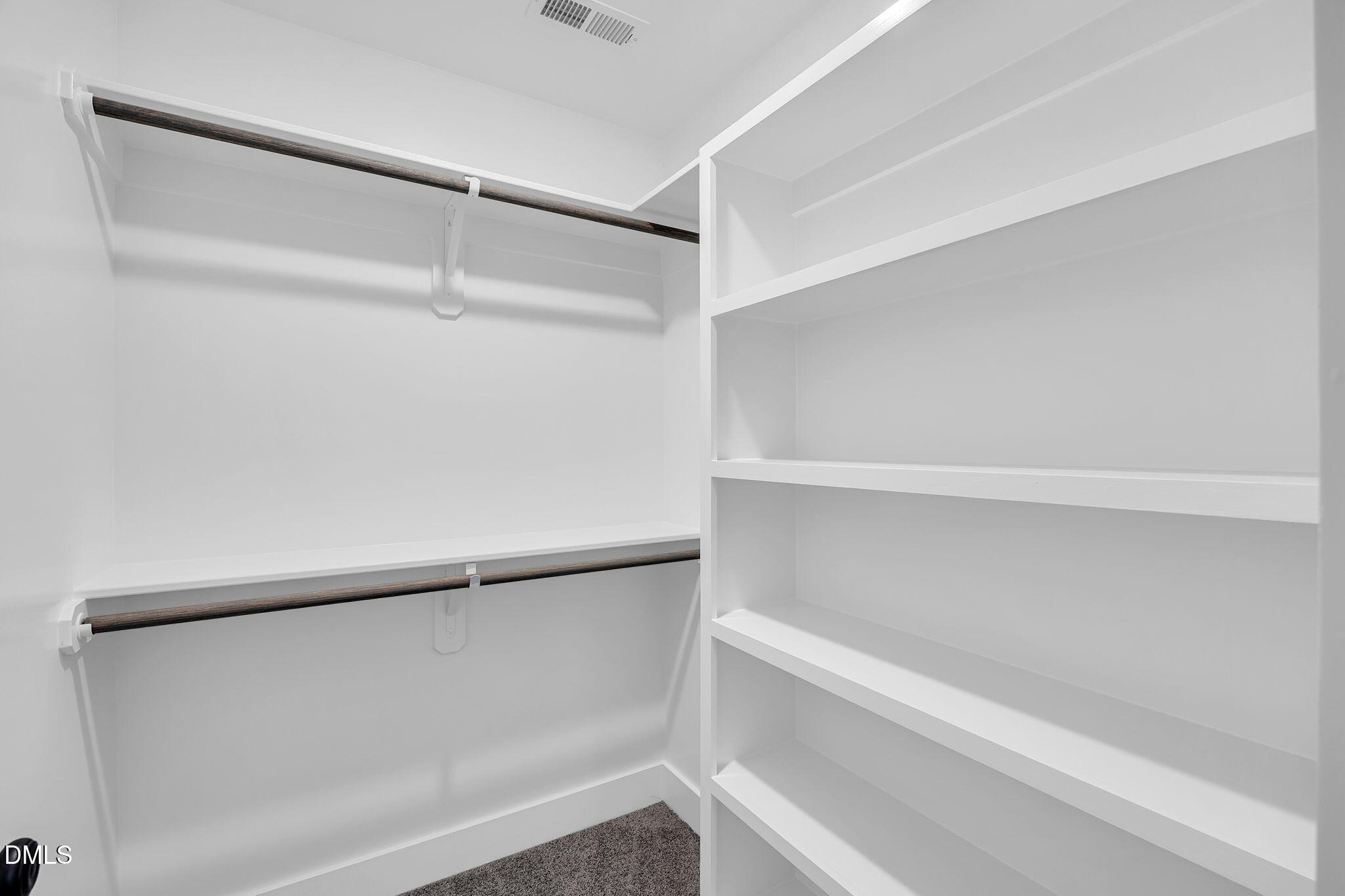 250 Freedom Ridge Drive Smithfield, NC 27577 - Photo 26 of 32 a view of an empty walk in closet