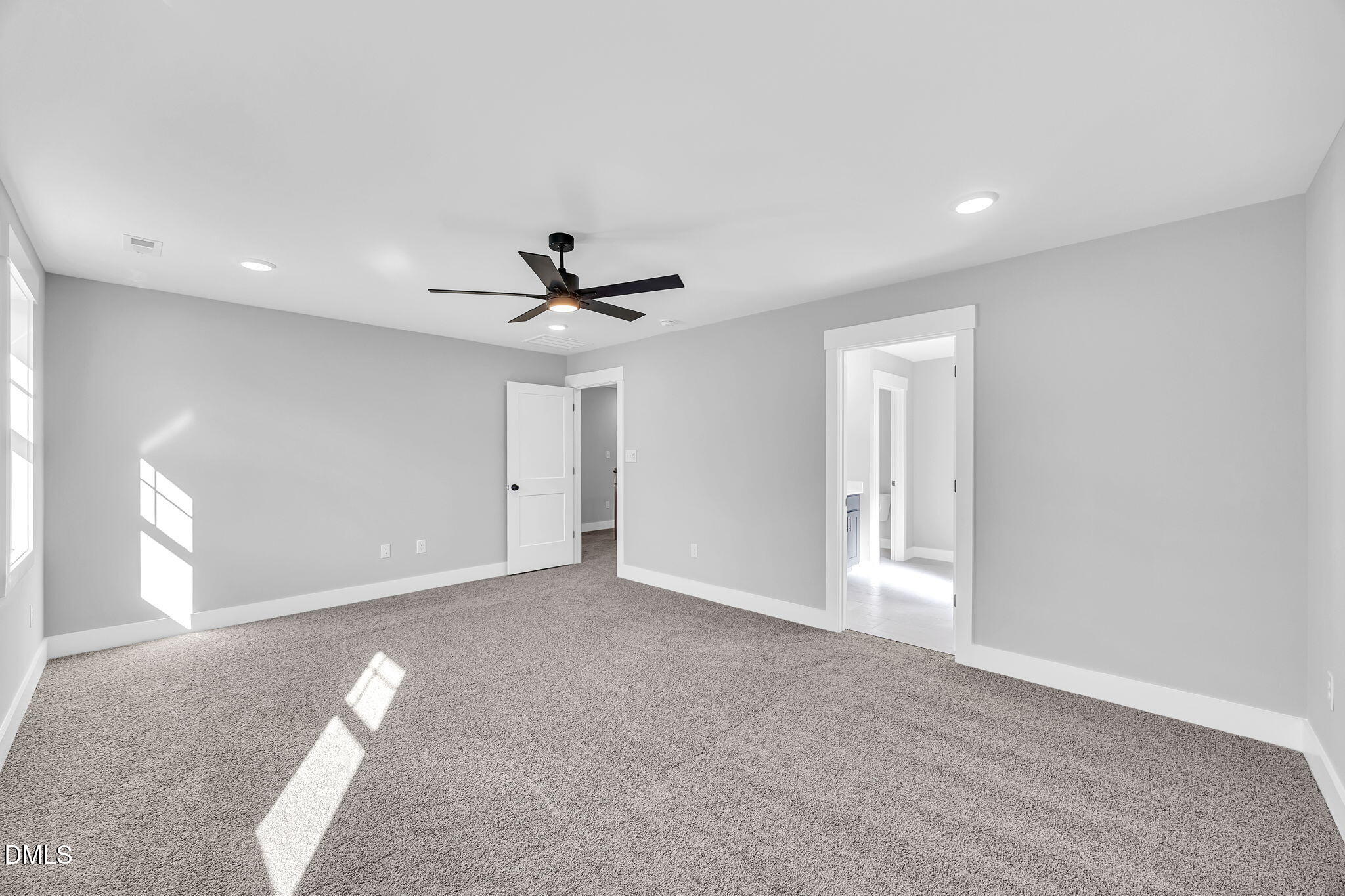 250 Freedom Ridge Drive Smithfield, NC 27577 - Photo 28 of 32 a view of an empty room with a ceiling fan