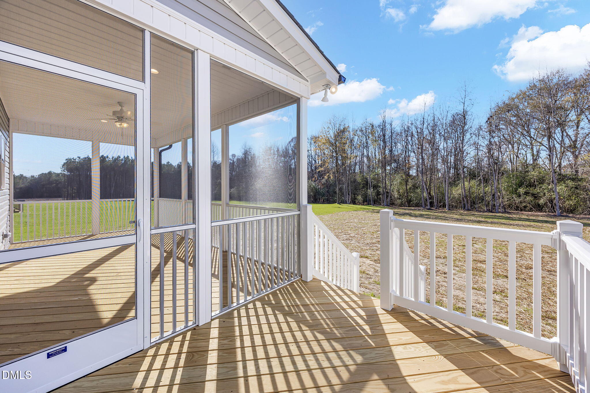250 Freedom Ridge Drive Smithfield, NC 27577 - Photo 29 of 32 a view of a balcony with wooden floor and fence