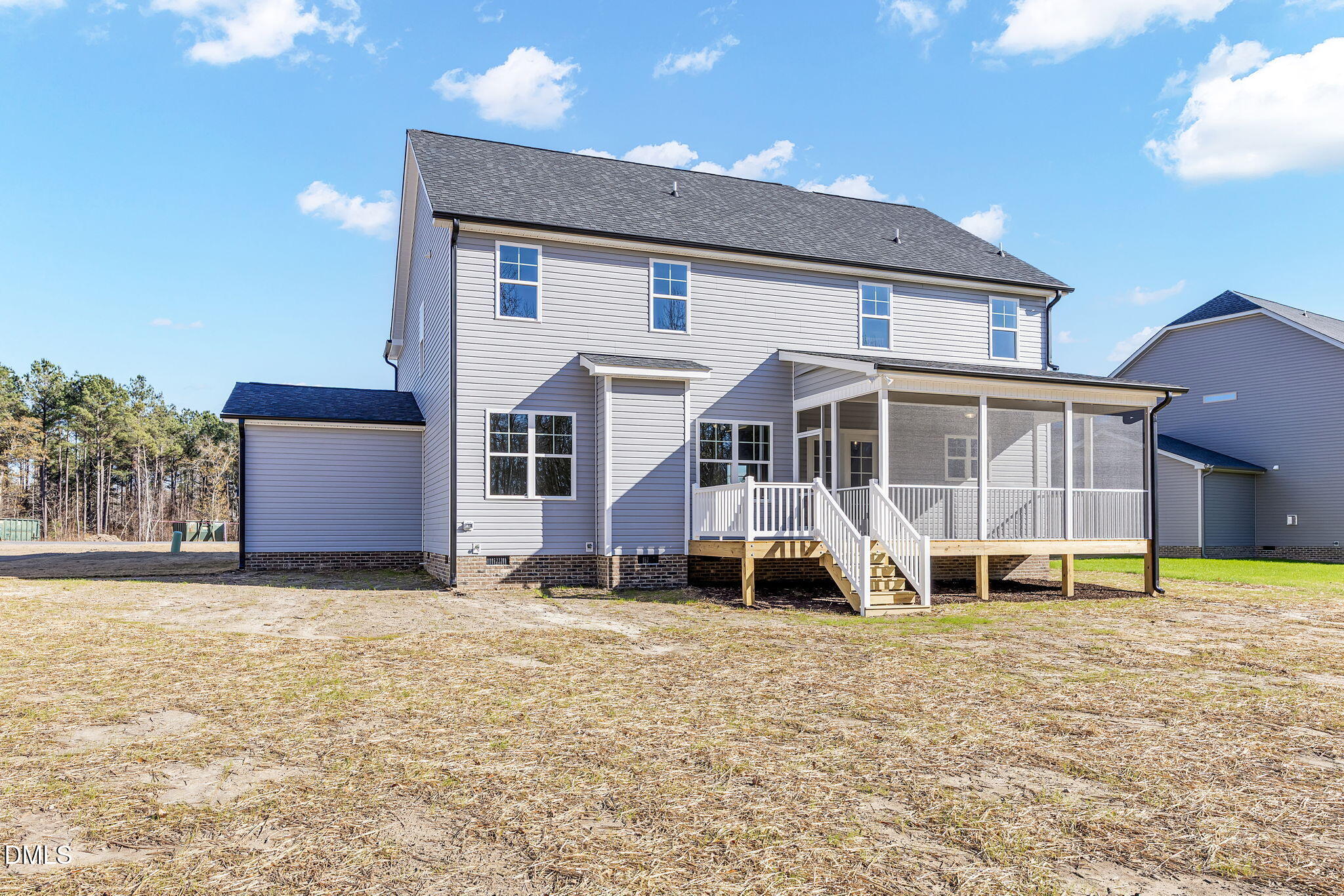 250 Freedom Ridge Drive Smithfield, NC 27577 - Photo 32 of 32 a front view of a house with a yard and seating space