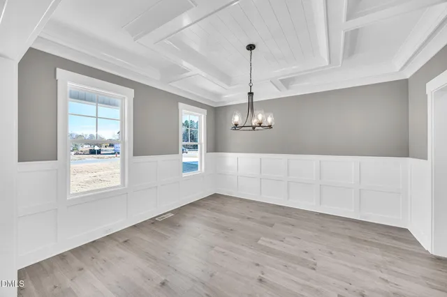a bathroom with a bathtub sink and mirror