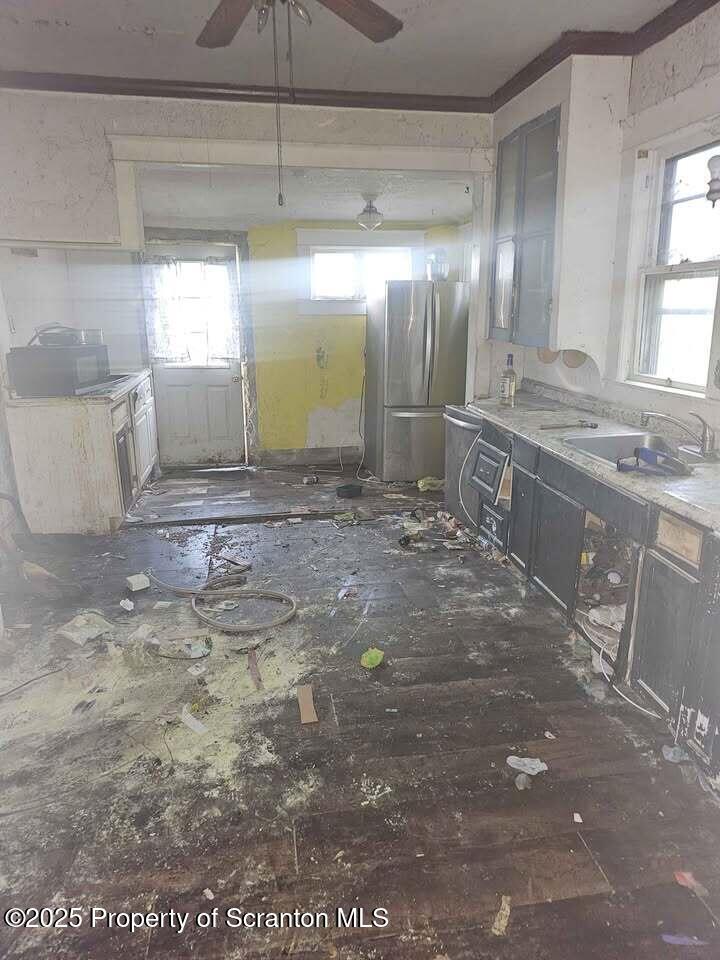 507 Delaware Street Forest City, PA 18421 - Photo 24 of 24 a large room with a lot of cabinets