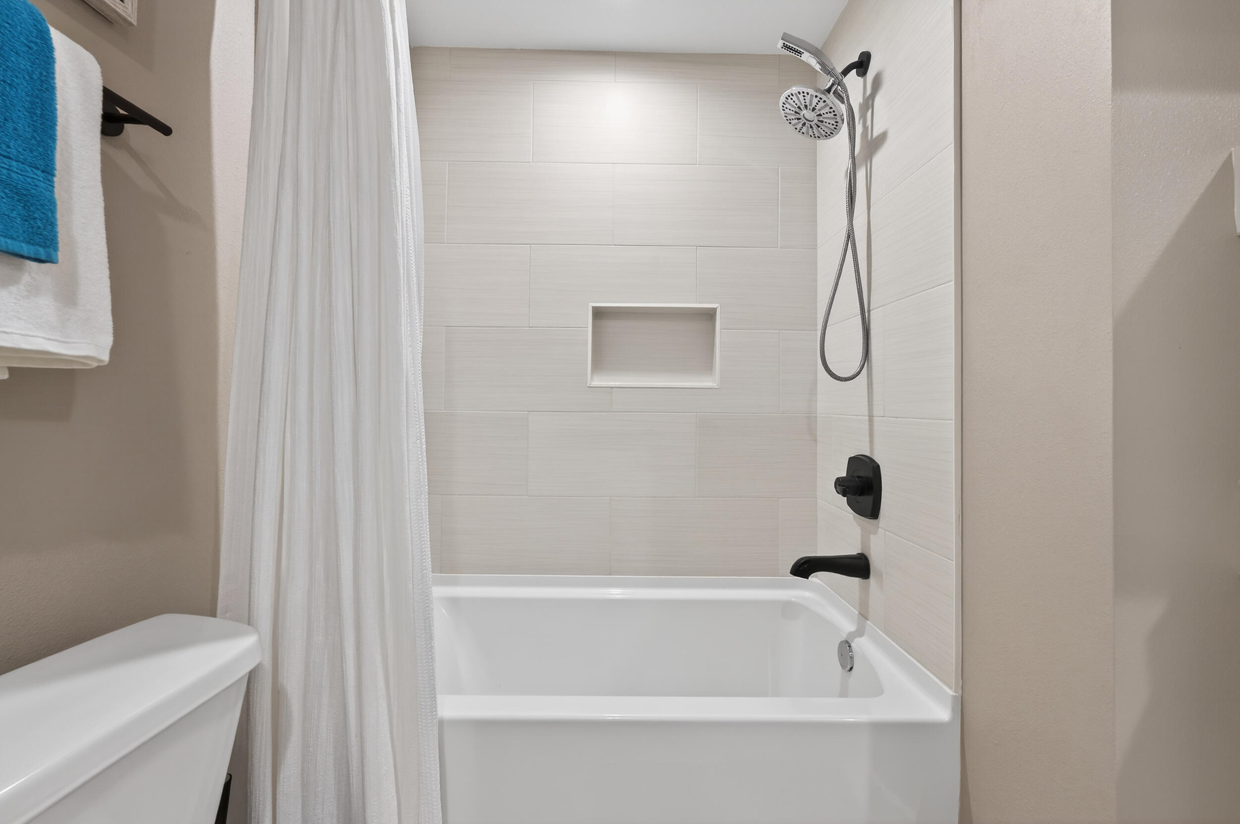 60 McDaniels Fishcamp Road, Unit A Freeport, FL 32439 - Photo 15 of 67 a bathroom with a bathtub and a shower