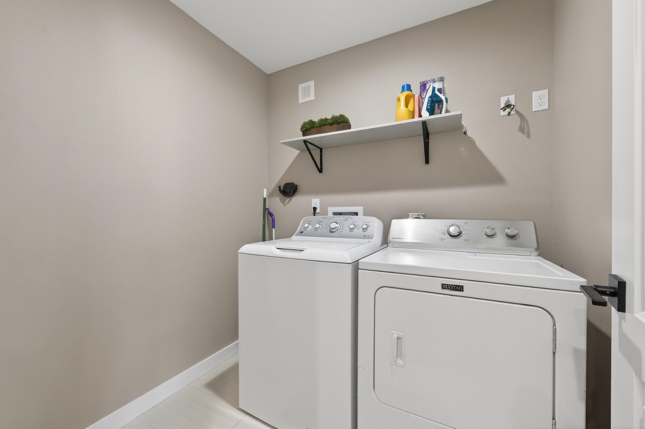 60 McDaniels Fishcamp Road, Unit A Freeport, FL 32439 - Photo 19 of 67 a utility room with dryer and washer