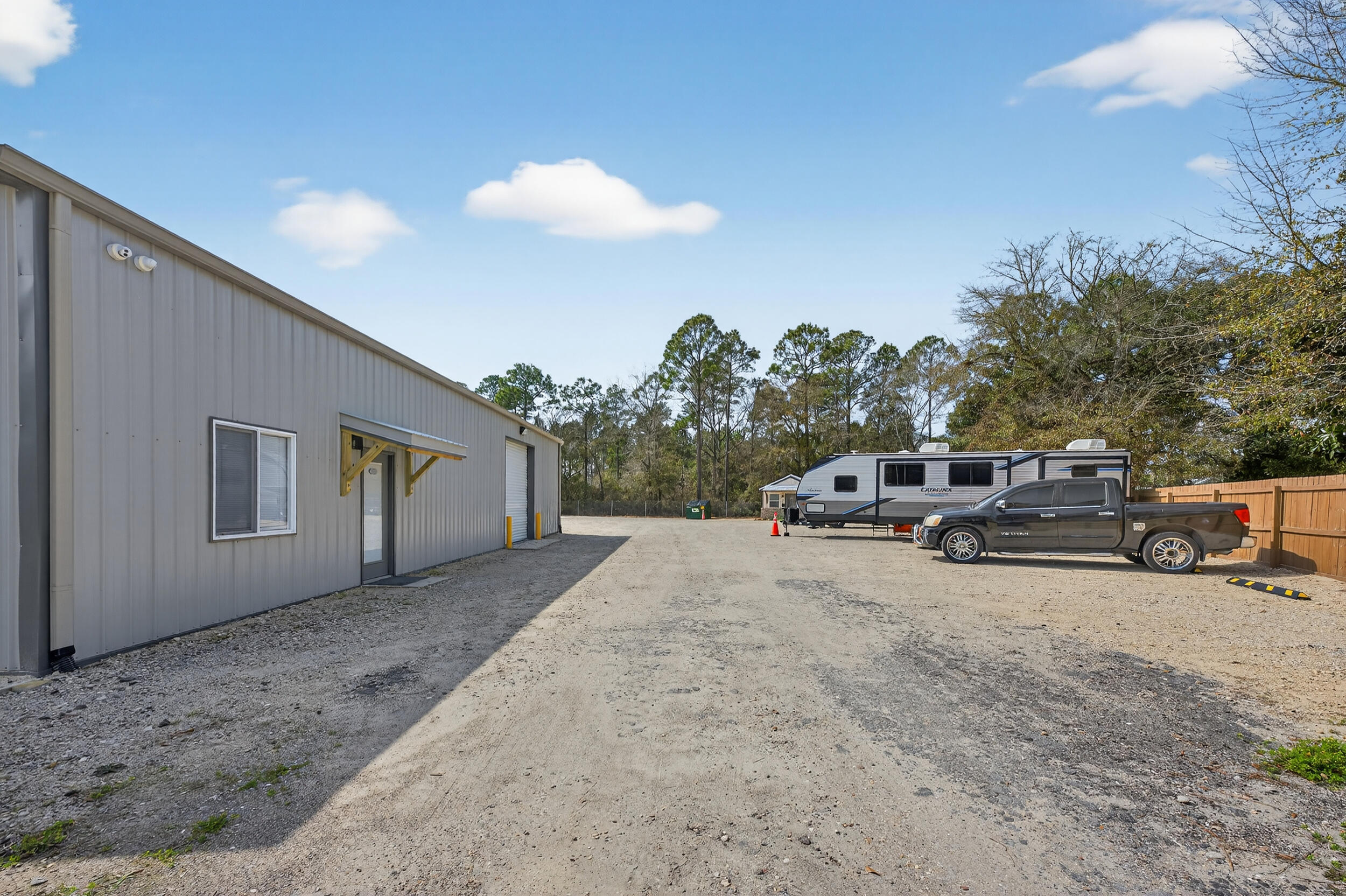 60 McDaniels Fishcamp Road, Unit A Freeport, FL 32439 - Photo 26 of 67 a view of car parked in parking area