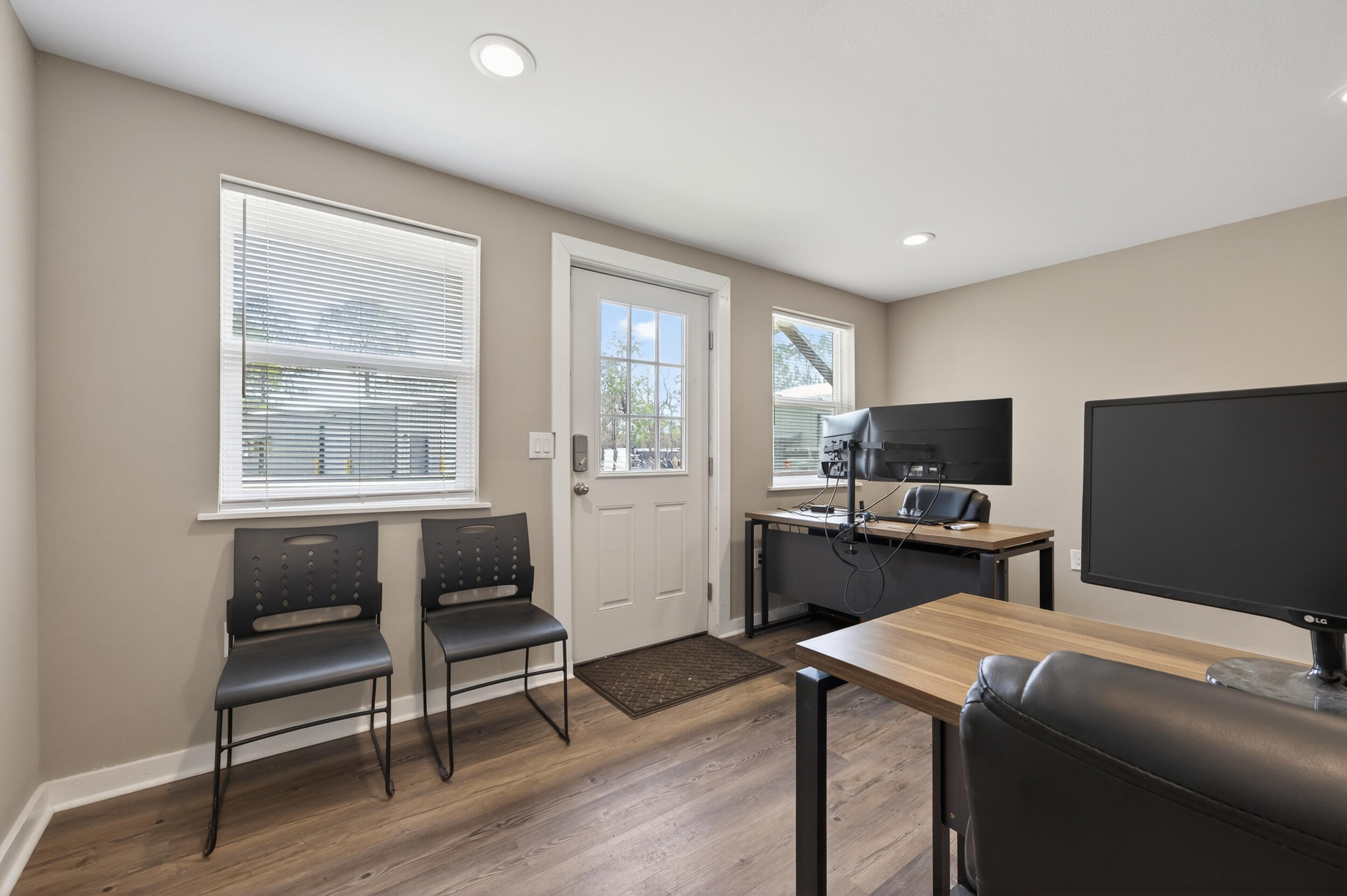 60 McDaniels Fishcamp Road, Unit A Freeport, FL 32439 - Photo 37 of 67 a bedroom with a bed and a flat screen tv