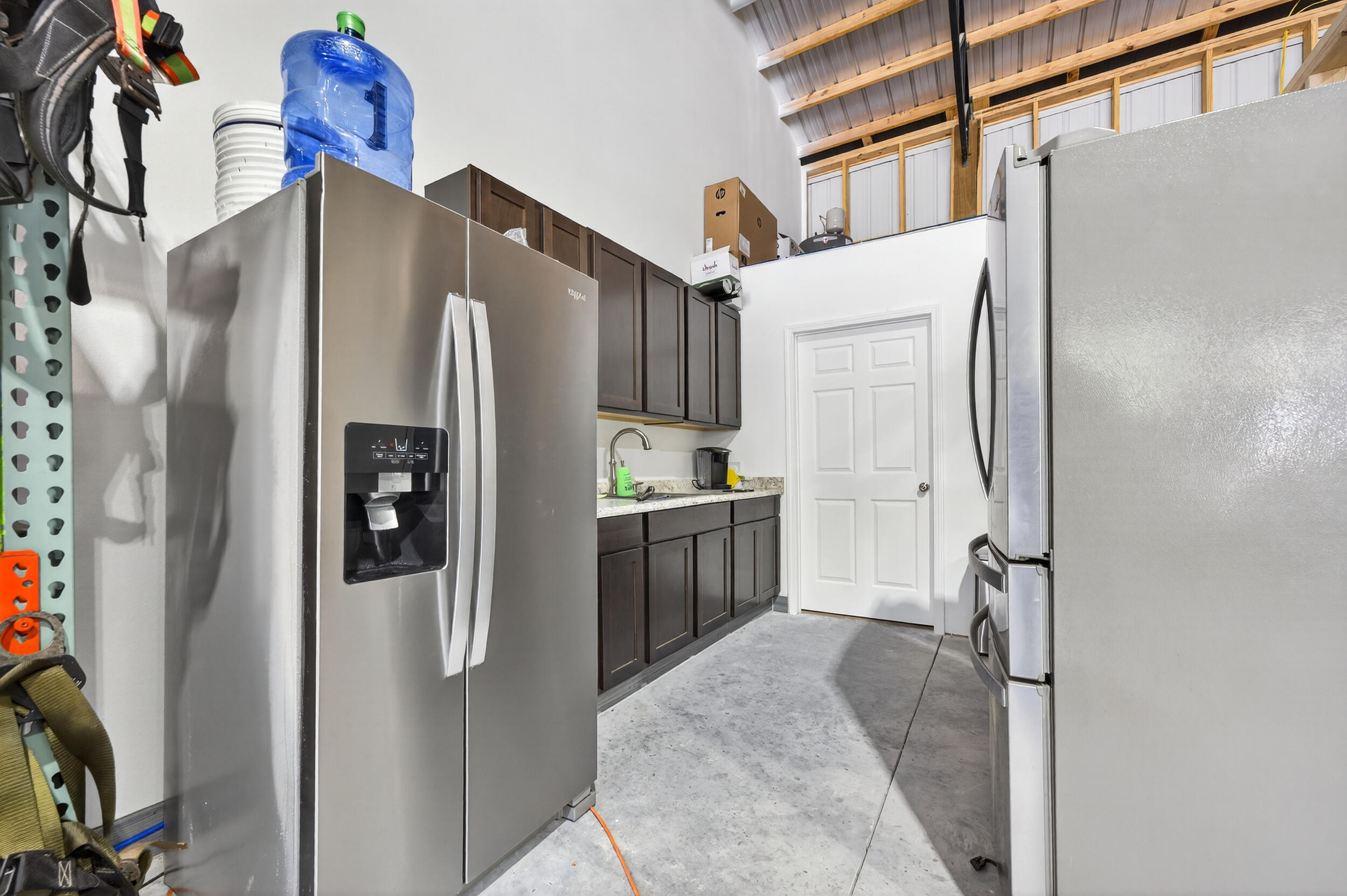 60 McDaniels Fishcamp Road, Unit A Freeport, FL 32439 - Photo 43 of 67 a kitchen with stainless steel appliances granite countertop a refrigerator and a stove