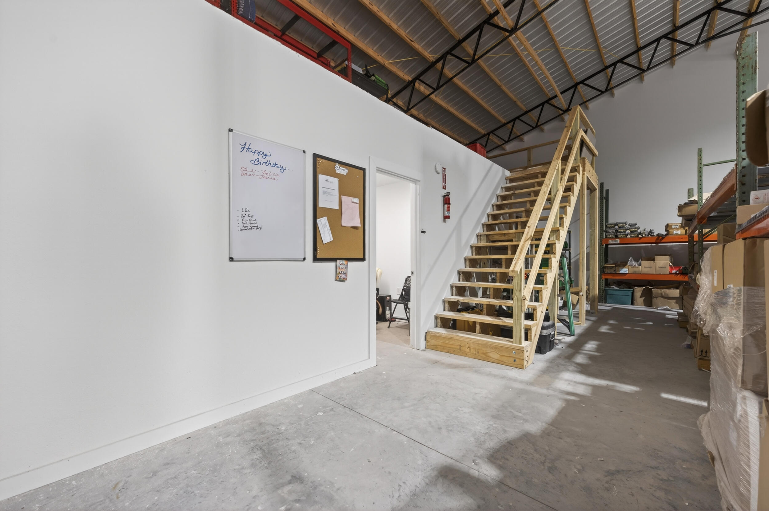 60 McDaniels Fishcamp Road, Unit A Freeport, FL 32439 - Photo 49 of 67 a view of an empty room with stairs and a couch