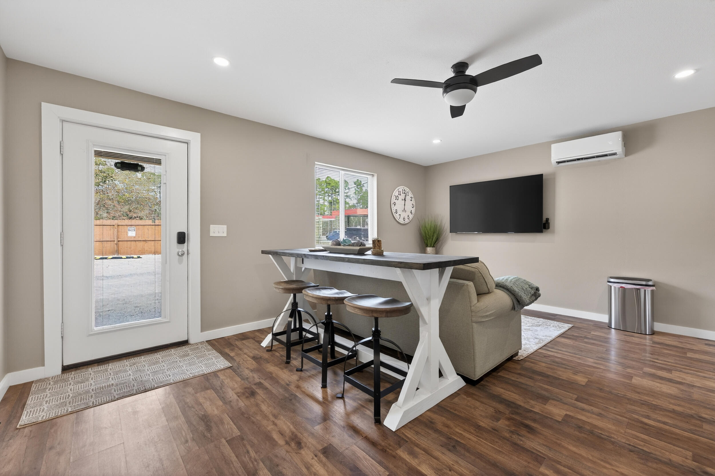 60 McDaniels Fishcamp Road, Unit A Freeport, FL 32439 - Photo 5 of 67 a living room with furniture and a flat screen tv