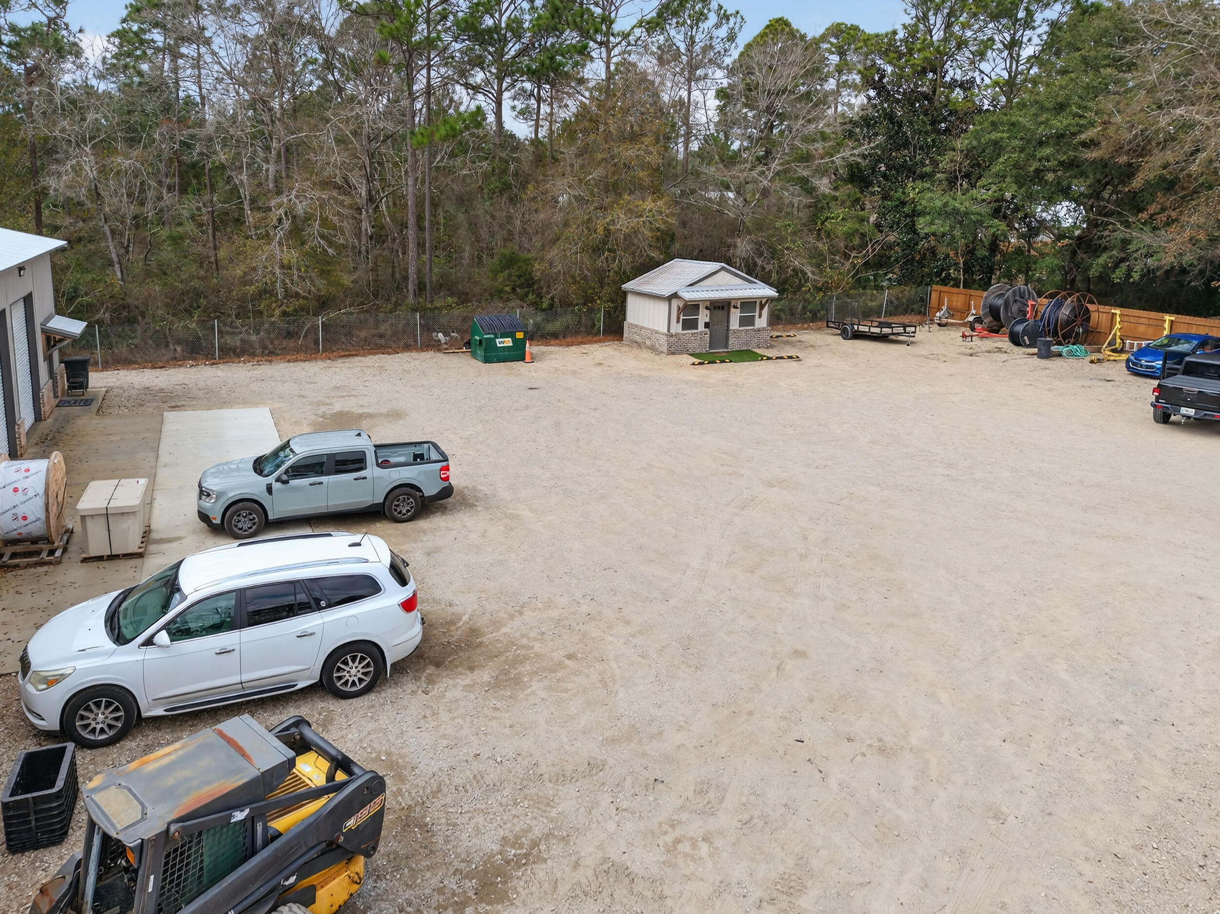 60 McDaniels Fishcamp Road, Unit A Freeport, FL 32439 - Photo 56 of 67 a view of a backyard with a car parked