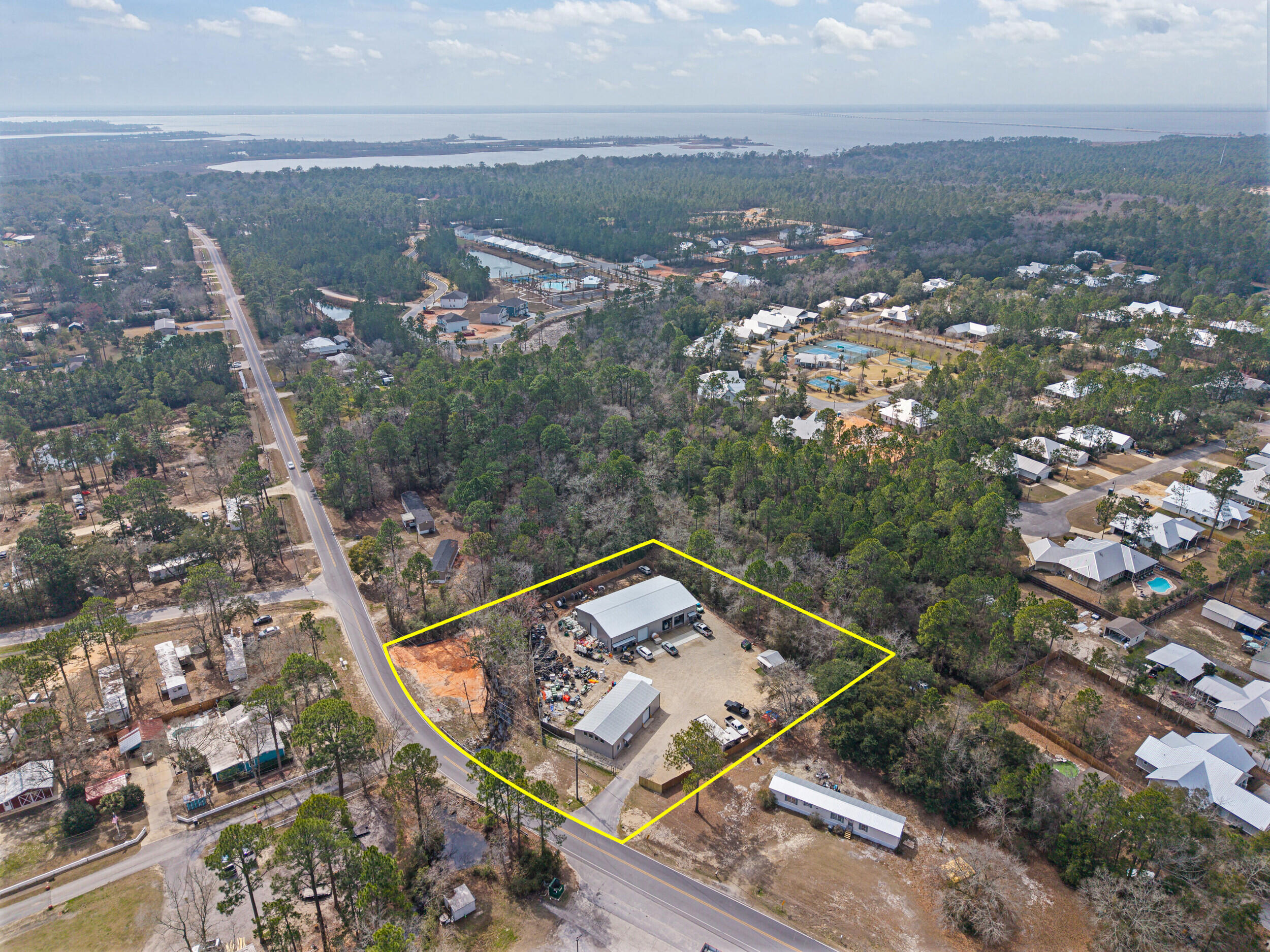 60 McDaniels Fishcamp Road, Unit A Freeport, FL 32439 - Photo 59 of 67 an aerial view of a house