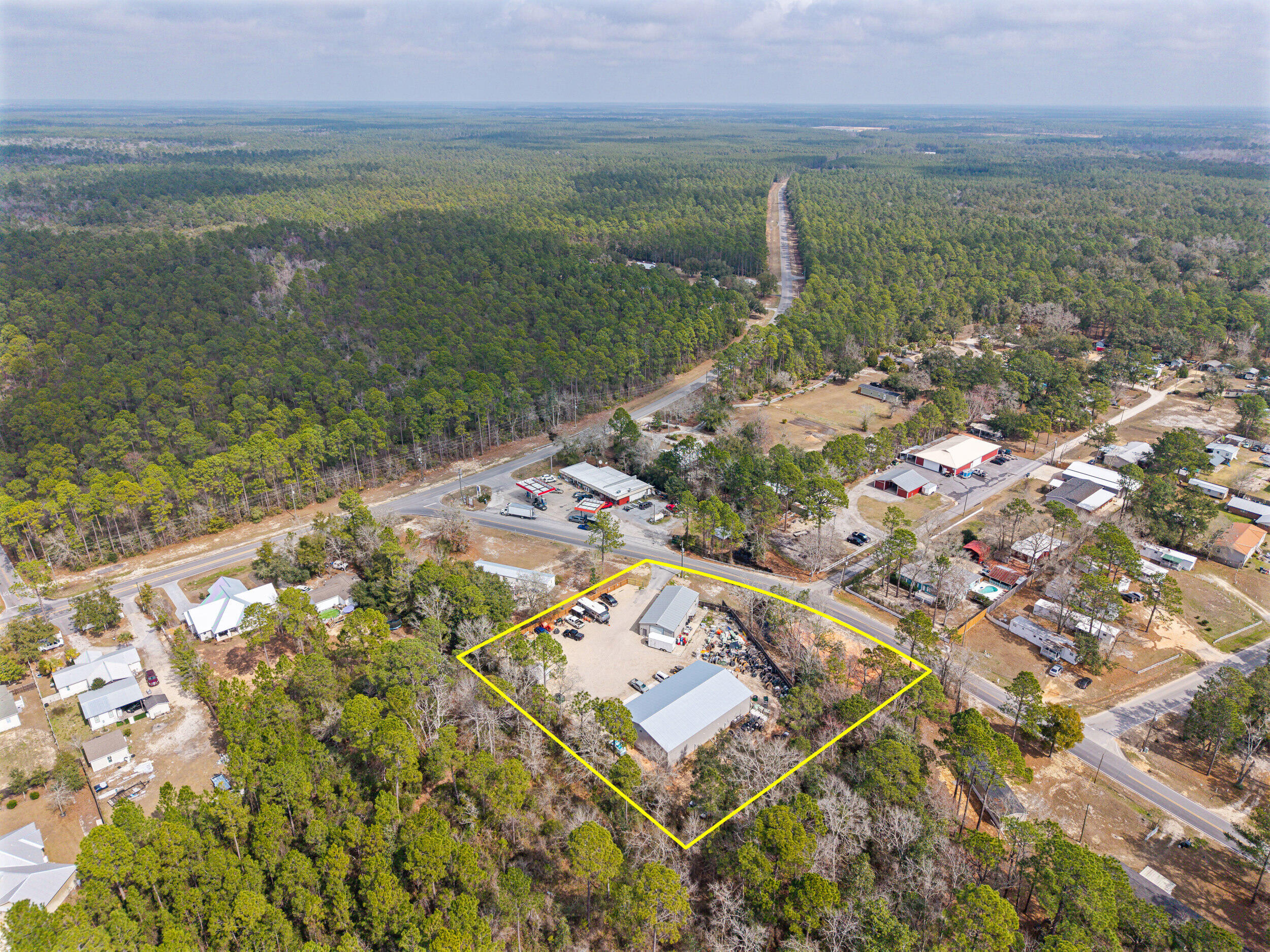 60 McDaniels Fishcamp Road, Unit A Freeport, FL 32439 - Photo 62 of 67 a view of a lake with a yard