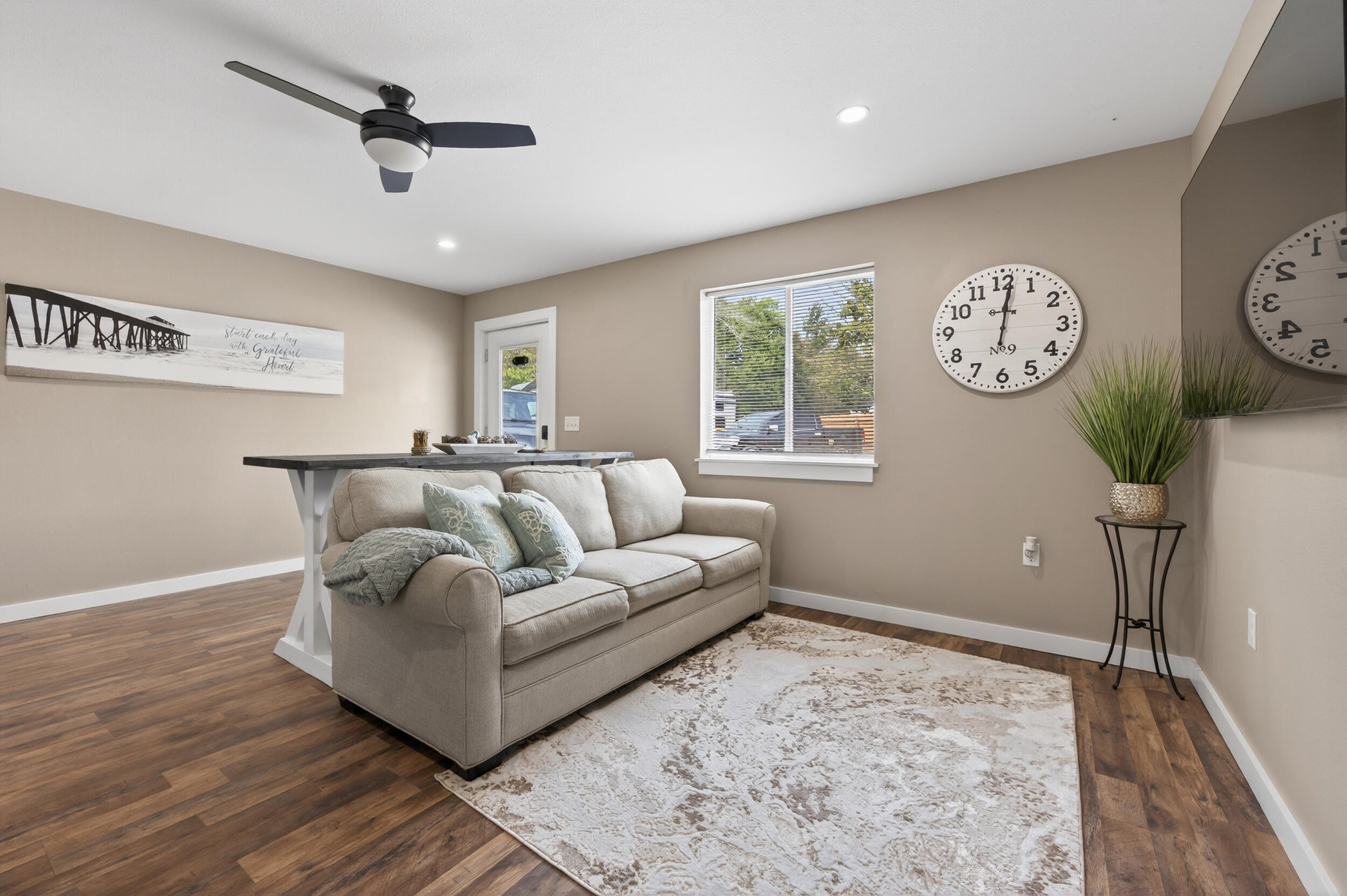 60 McDaniels Fishcamp Road, Unit A Freeport, FL 32439 - Photo 9 of 67 a living room with furniture and a large window