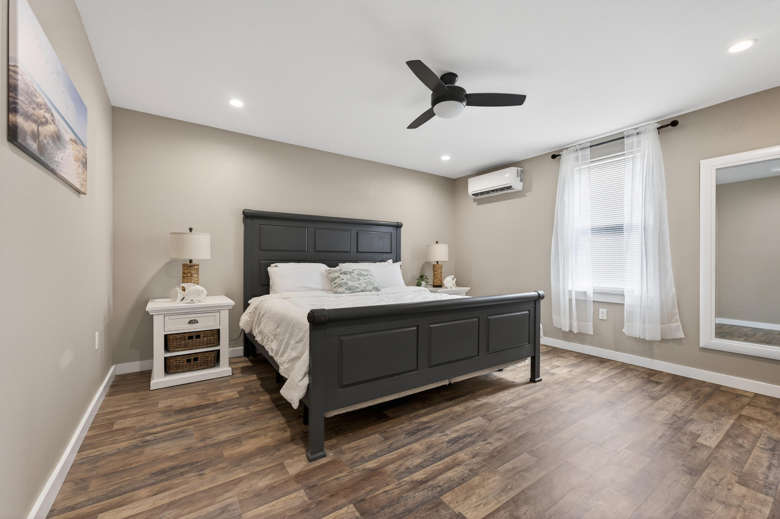 60 McDaniels Fishcamp Road, Unit A Freeport, FL 32439 - Photo 10 of 67 a bed room with a bed and a ceiling fan