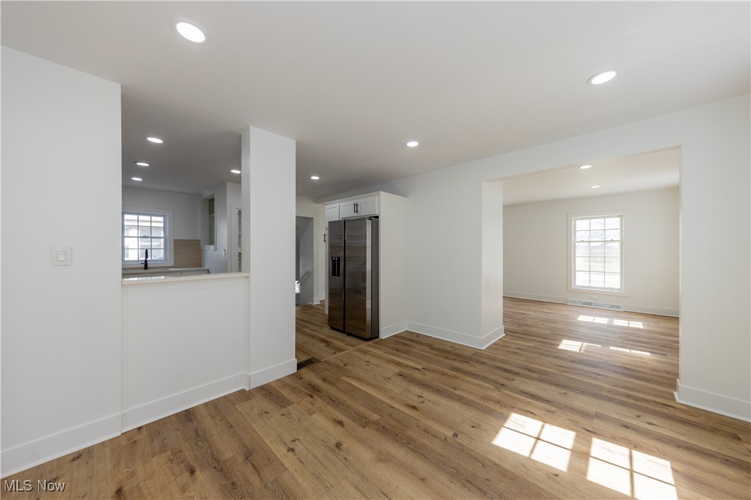 3694 Chelton Road Cleveland, OH 44120 - Photo 8 of 33 Unfurnished living room with baseboards, recessed lighting, and light wood finished floors