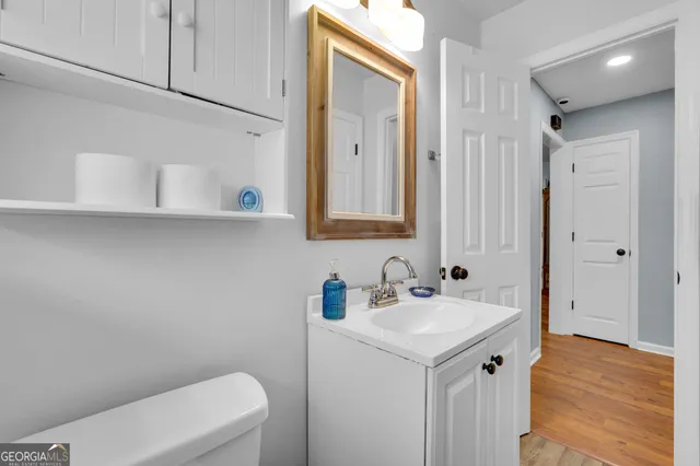 a view of a patio with a table chairs and a backyard