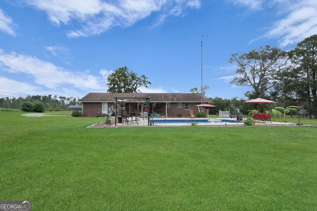 a view of a lake with a yard