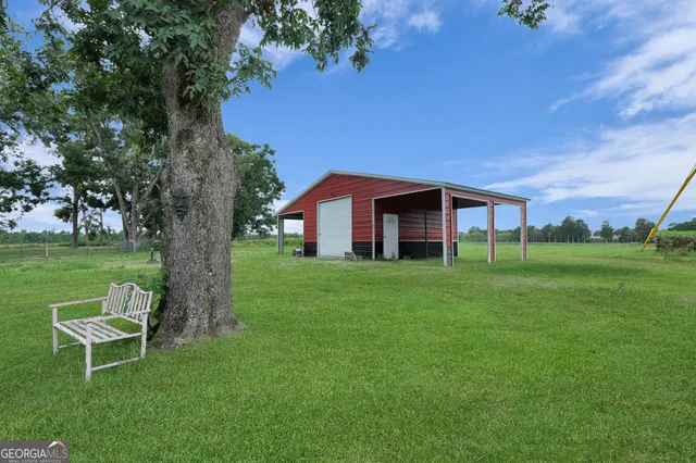 a view of a lake with a yard