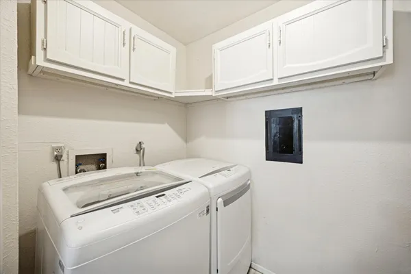 a utility room with dryer and washer
