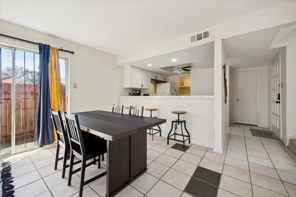 a view of a dining room with furniture
