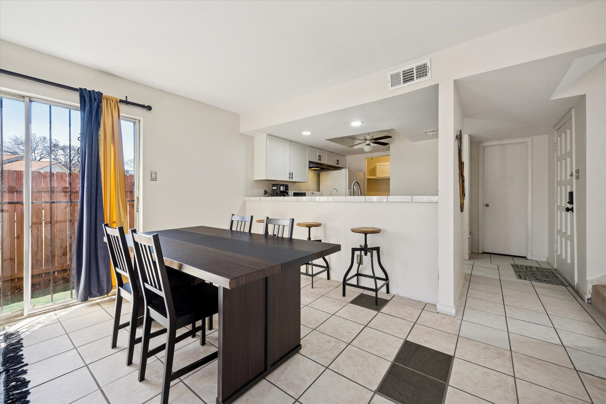 4814 Misty Slope Lane Austin, TX 78744 - Photo 4 of 17 a view of a dining room with furniture