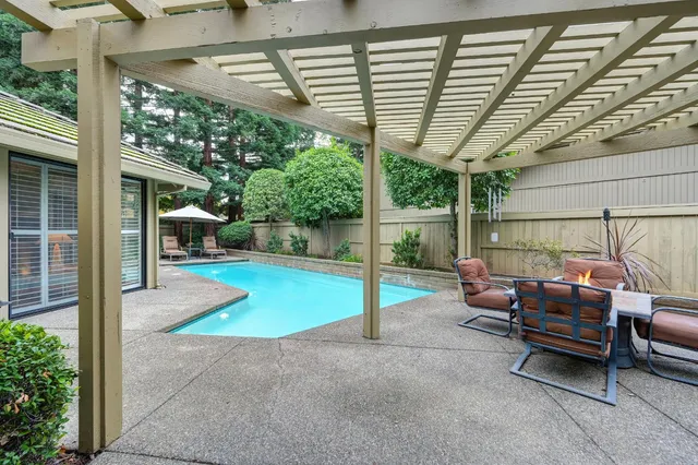 an aerial view of residential house with outdoor space