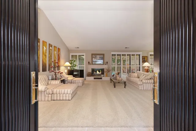 a kitchen with a stove a refrigerator and a sink