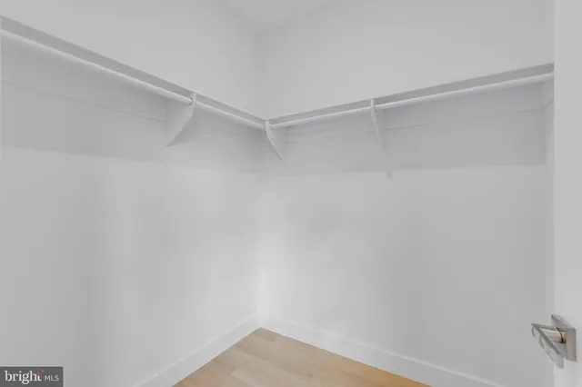 a view of an empty walk in closet