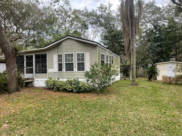 3000 Clarcona Road, Unit 2828 Apopka, FL 32703 - Photo 1 of 1 a front view of a house with a garden