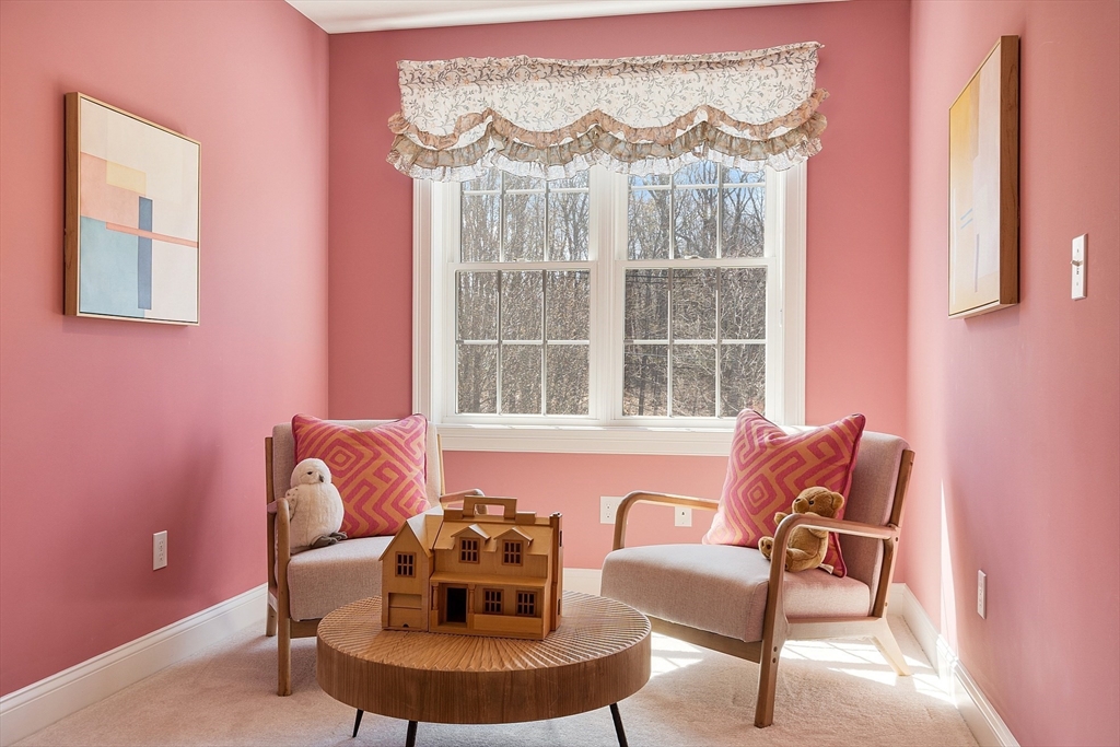 1148 Hill Road, Unit 1148 Boxborough, MA 01719 - Photo 23 of 31 a living room with furniture and a window