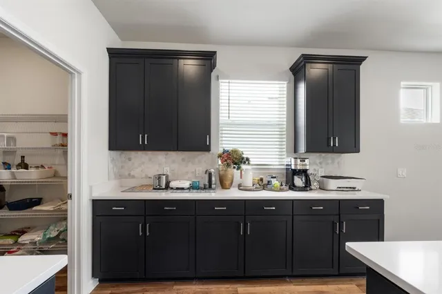 a bathroom with double sink and a mirror