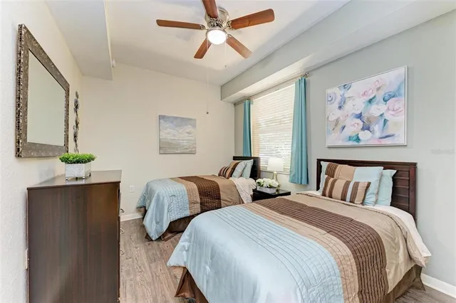 a bathroom with a sink a toilet and shower curtain