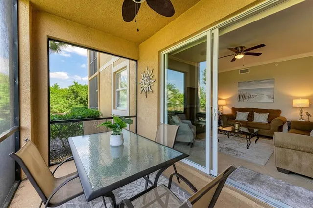 a view of a garden with a building in the background