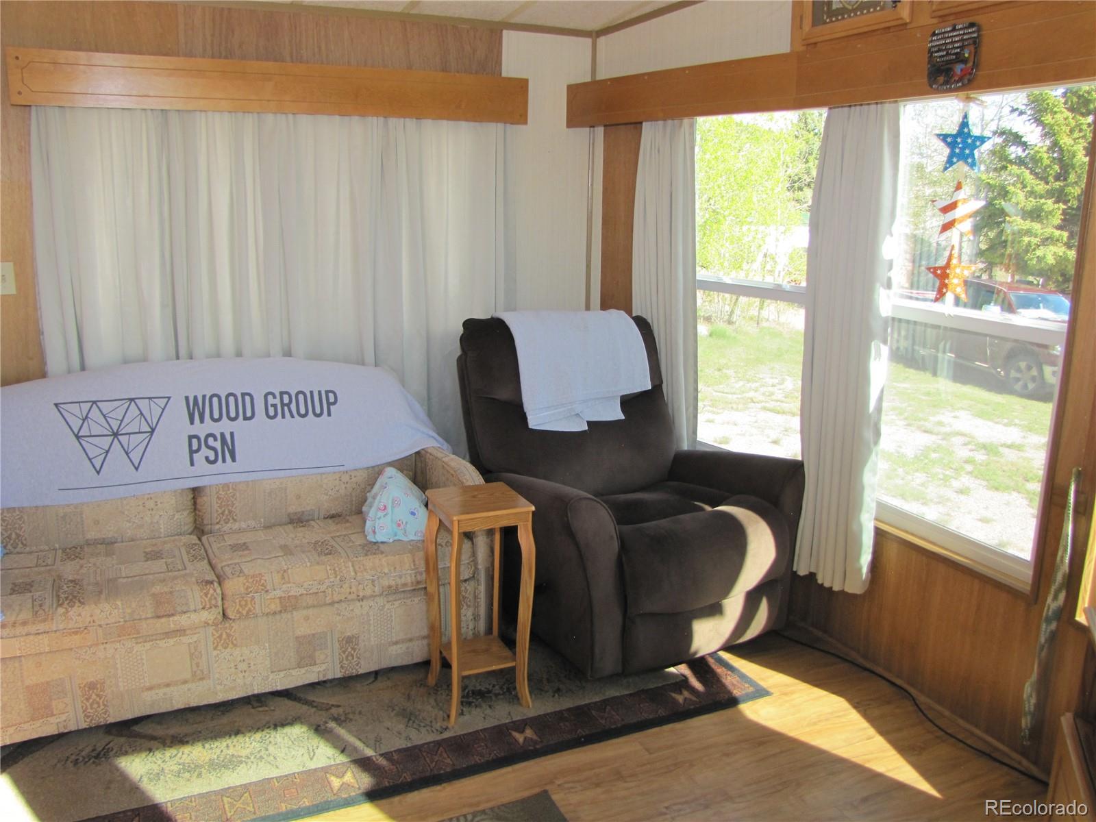 234 Smoke Stack Road Fairplay, CO 80440 - Photo 11 of 19 a view of a room with furniture and a window