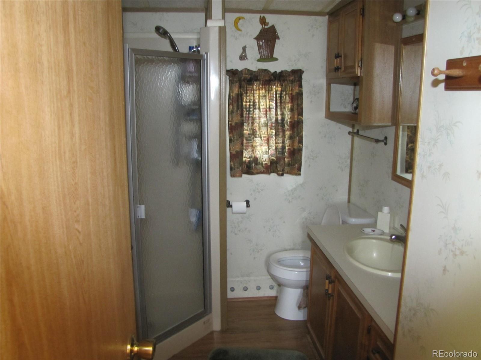 234 Smoke Stack Road Fairplay, CO 80440 - Photo 17 of 19 a bathroom with a toilet sink and shower