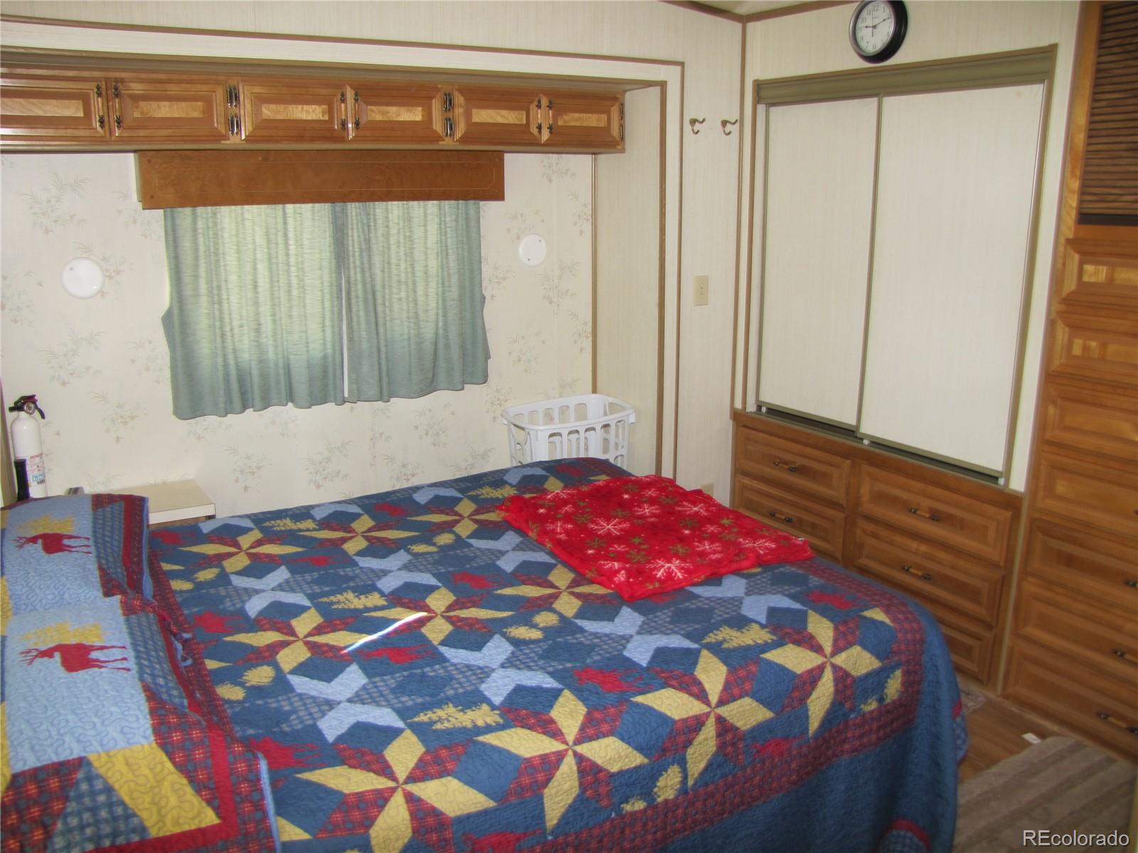 234 Smoke Stack Road Fairplay, CO 80440 - Photo 18 of 19 a bedroom with a bed and a window