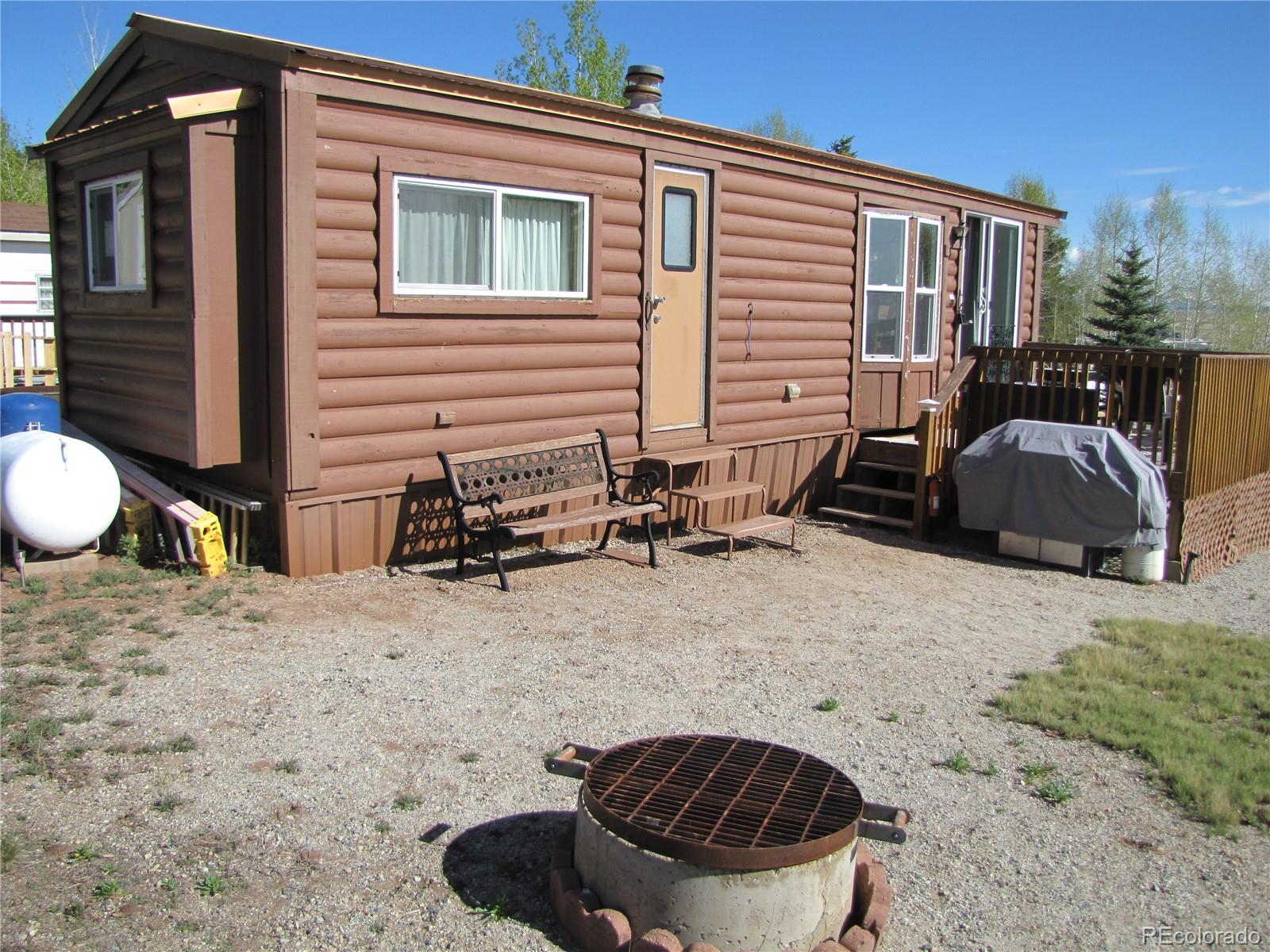 234 Smoke Stack Road Fairplay, CO 80440 - Photo 4 of 19 a backyard of a house with table and chairs