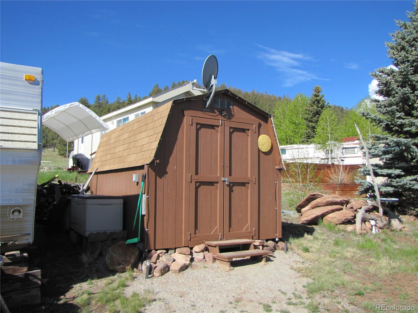 234 Smoke Stack Road Fairplay, CO 80440 - Photo 5 of 19 a front view of a house with parking area