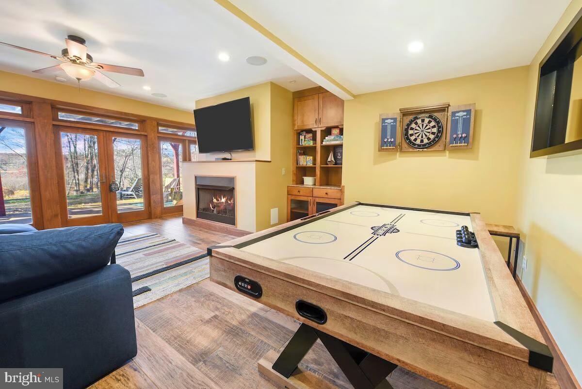 185 Ruta Lane Swanton, MD 21561 - Photo 38 of 81 a living room with furniture and a flat screen tv