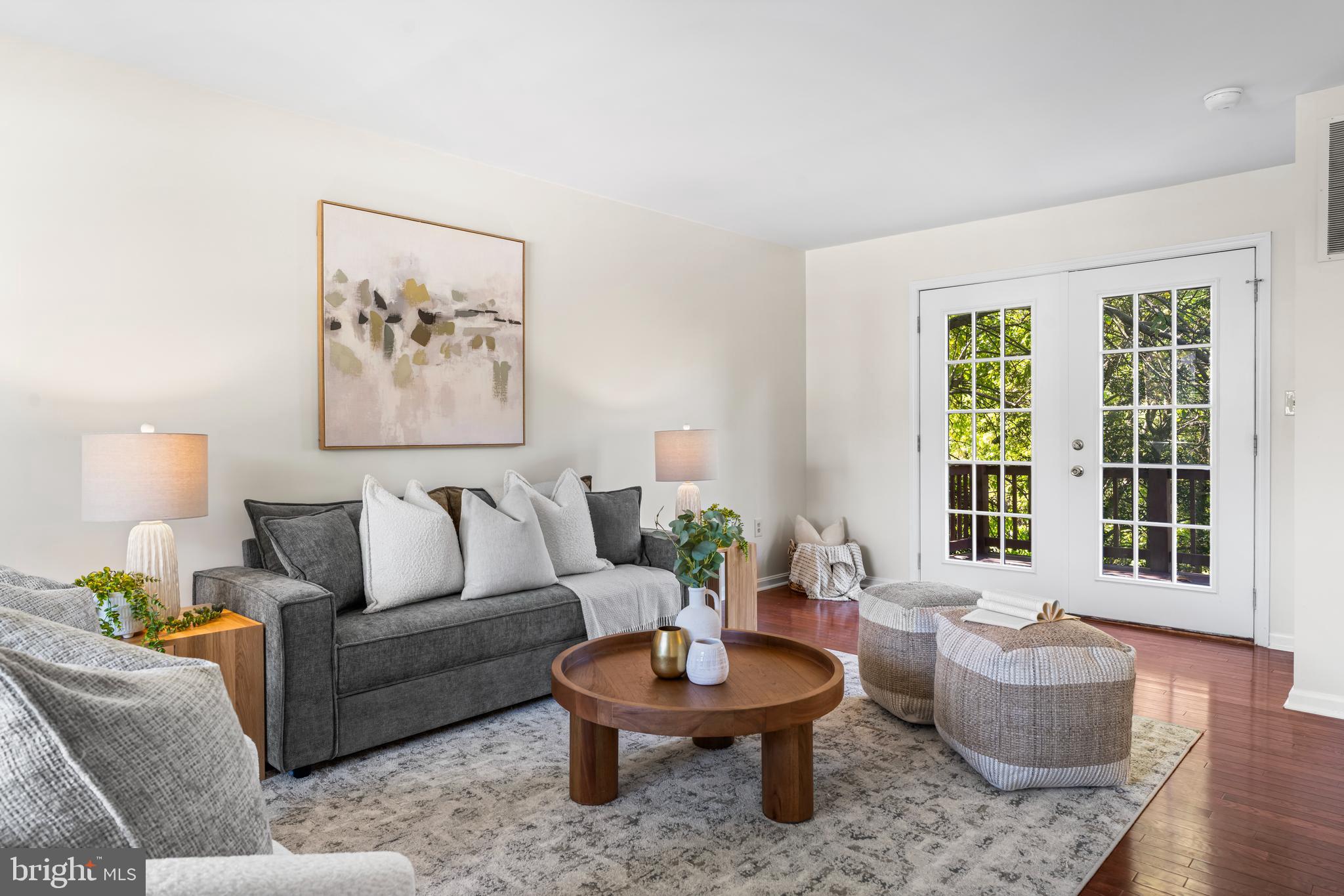 6416 Sherwood Road Baltimore, MD 21239 - Photo 2 of 29 a living room with furniture and a potted plant