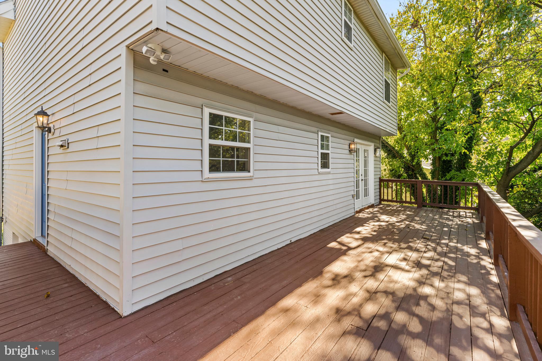 6416 Sherwood Road Baltimore, MD 21239 - Photo 27 of 29 a view of a house with a yard