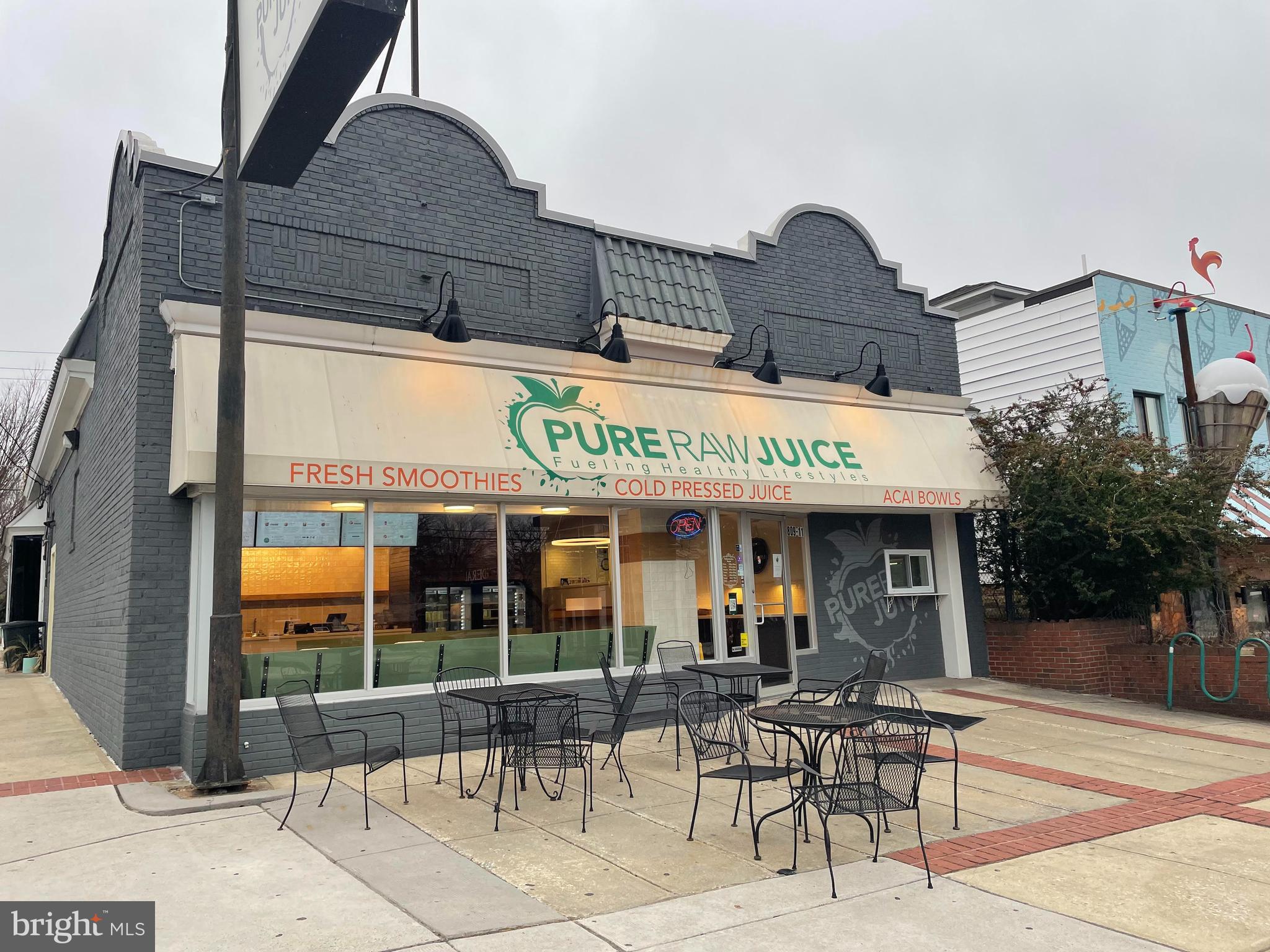 6416 Sherwood Road Baltimore, MD 21239 - Photo 39 of 43 a view of a cafe with sitting area