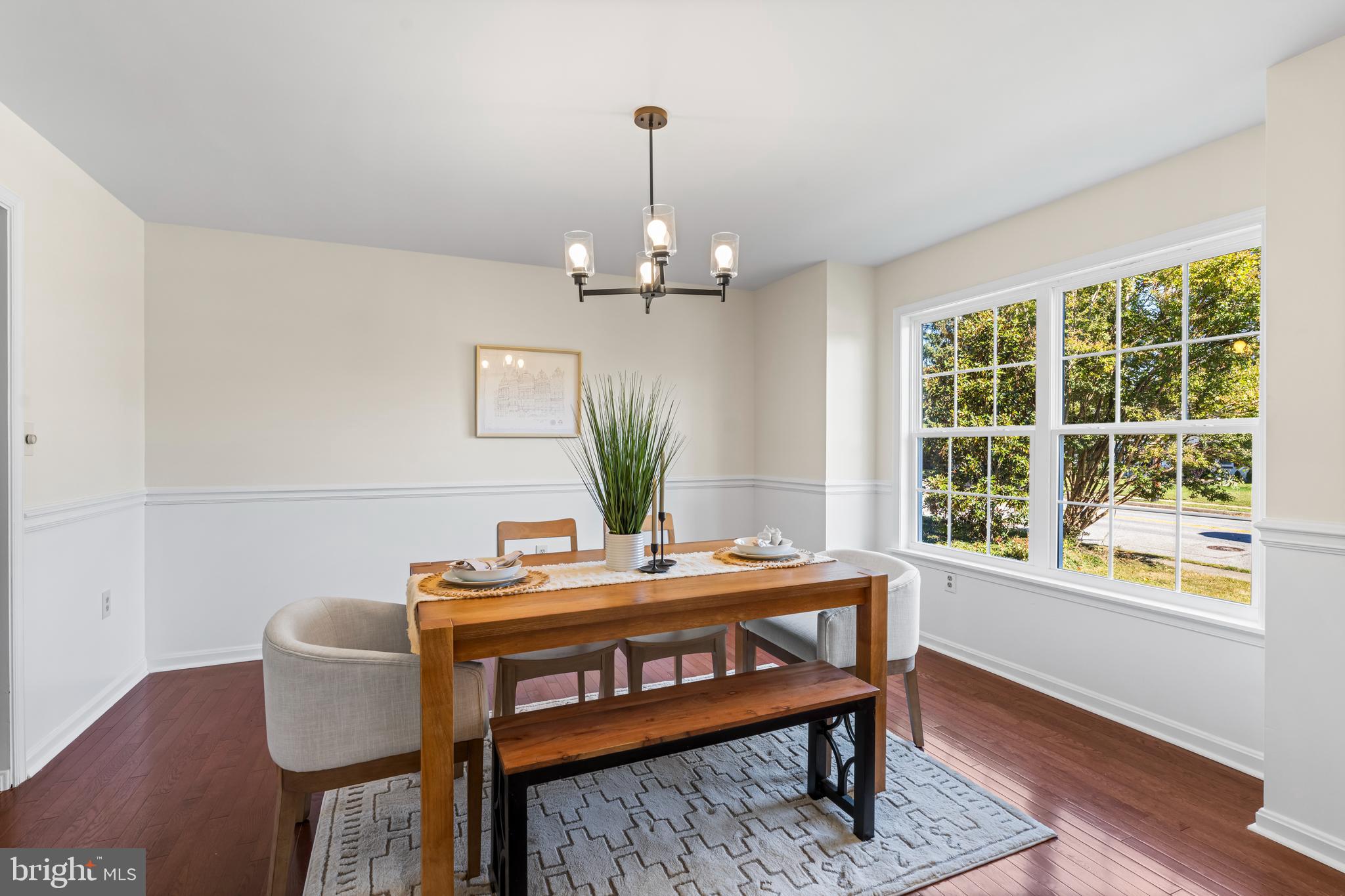 6416 Sherwood Road Baltimore, MD 21239 - Photo 6 of 43 a dining room with furniture and window