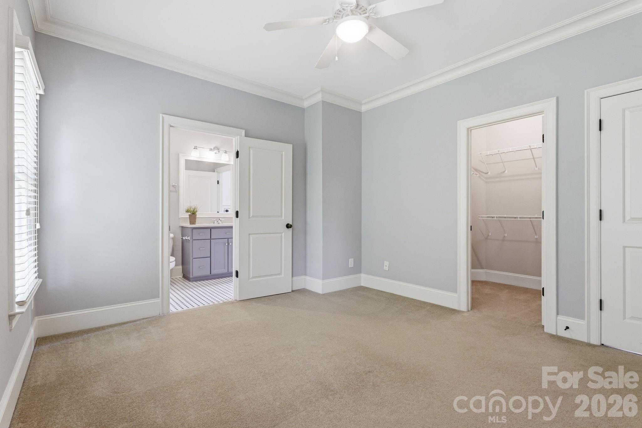 235 Grey Road Davidson, NC 28036 - Photo 22 of 42 an empty room with fan and entrance